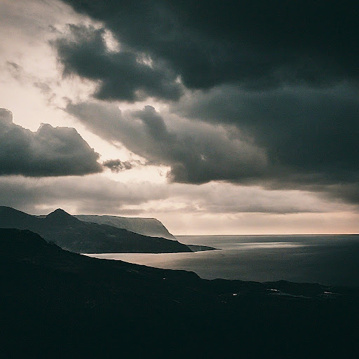 A picture of dark clouds breaking over the sea.